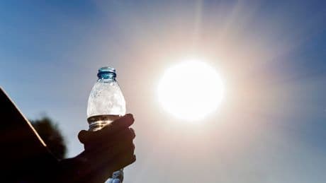 Neighbors back Arizona man in fight against HOA after he was repeatedly fined $100 for handing out free bottles of water