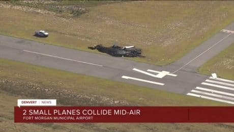 One dead and three injured after two planes crash mid-air