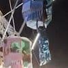 Woman left dangling 30ft in the air after falling from ferris wheel