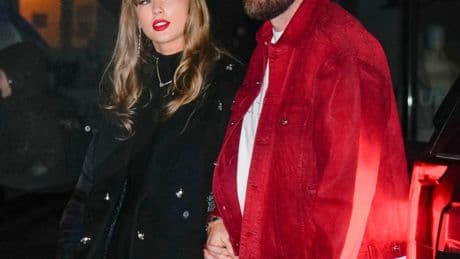 Travis Kelce gifts Taylor Swift entire new $80k summer wardrobe including $6.1k Prada bag as couple spends time apart
