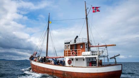 Viking longboat greets Liberation Convoy as it arrives in Shetland
