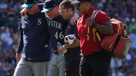 Two baseball players taken ill in the heat as sweltering weather intensifies across the US