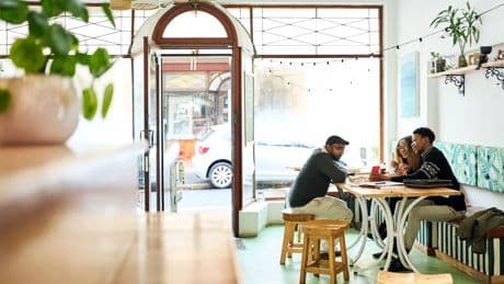 I moved to a new city in my 20s and knew no one. Going to the same café every day helped me make connections.