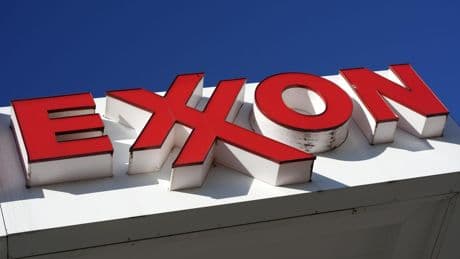 Profits for American oil giants like Exxon Mobil and Chevron fade in tandem with oil demand