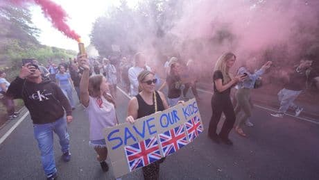 Bottles and flares thrown during another protest outside Essex hotel