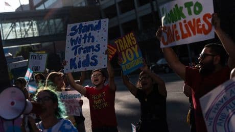 Protesters rally against closure of largest gender-affirming care center for kids in the US