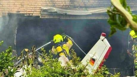 Two people killed in Germany after plane crashes into house and bursts into flames