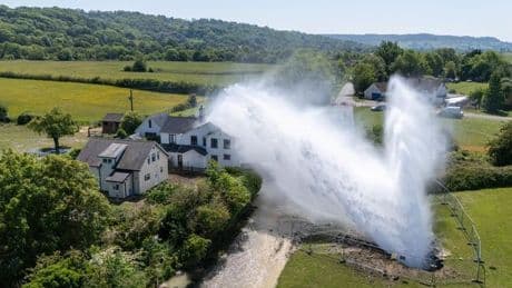 Dramatic footage shows devastating burst water main battering home