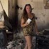 British mother breaks down in tears as she surveys the smouldering remains of her Cyprus villa after family was forced to flee deadly wildfires with seconds to spare