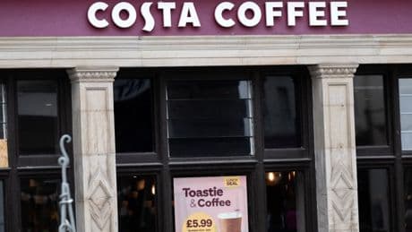 Three injured as car smashes through Costa Coffee window with air ambulance deployed