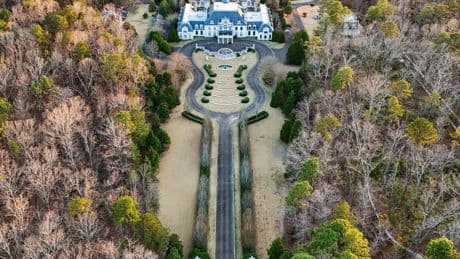 The largest home in Alabama, famous for its guitar-shaped driveway, is for sale. See inside the Versailles of Shoal Creek.