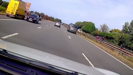 Hair-raising moment Ford Fiesta drives wrong way down busy motorway