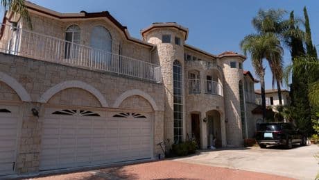Questions about surrogacy are raised in case of California couple with house brimming with kids