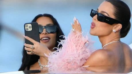Kardashians use Bezos' wedding to 'self promote' as expert explains 'selfie obsessed' sisters
