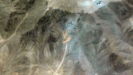 Satellite images appear to show excavators and bulldozers at work at Iran's bombed-out nuclear site