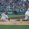 Schwarber hits 18th homer, go-ahead double as Phils win 9th in row and extend A's slide to 11 games