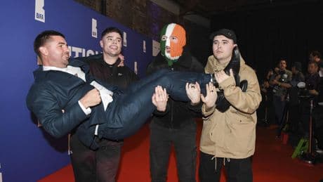 U.K. counterterror police say they will investigate comments by Irish rap group Kneecap