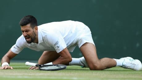 Novak Djokovic survives late fall to seal spot in Wimbledon semi-finals
