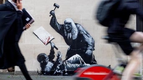 New Banksy showing judge hitting protester with gavel appears on High Court