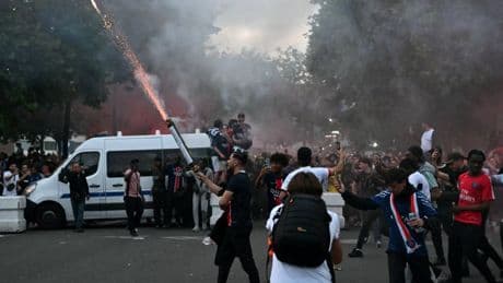 Masked ultras hurl fireworks at riot police in Paris Champions League final clash