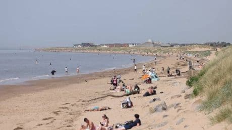 Seaside town with its own beach bar and some of the best sunsets in the UK