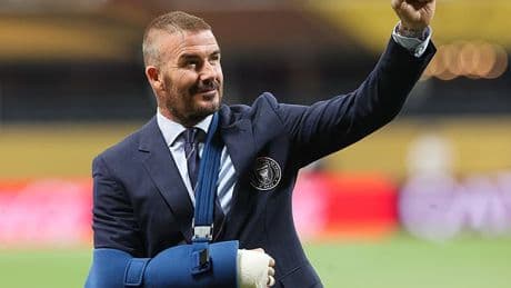 David Beckham is pictured for first time in plaster cast since being hospitalised with 'unbearable' pain... as England legend waves to fans ahead of Inter Miami's Club World Cup clash against PSG