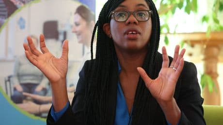 Tory leader Kemi Badenoch speaks with patients and staff on visit to hospice