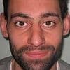 Sadistic Saw-inspired murderer who sliced through victim's spinal cord has his jail term extended to 2065 for savagely stabbing two prison guards