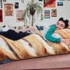 Greggs fans sent into a spin after the brand launches its first-ever homewares range with huge Steak Bake floor cushion and Sausage Roll beanbag