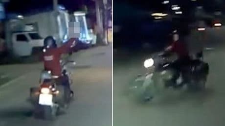 Instant karma for British biker who blocks ambulance driver on emergency call in Thailand and flips driver the middle finger... then regrets taking his eye off the road