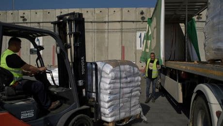 90 truckloads of aid picked up in Gaza after delays at crossing with Israel