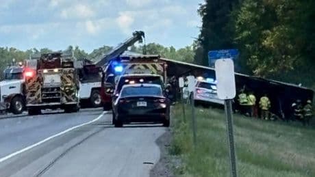 Tour bus crash kills multiple people including child and traps dozens in New York