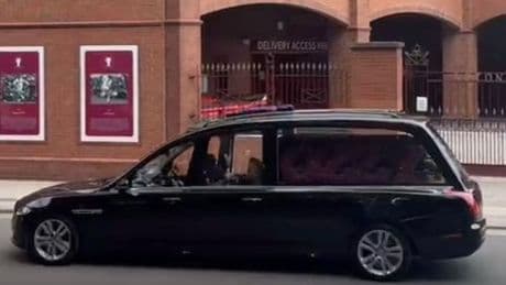 BREAKING: Ozzy Osbourne's coffin adorned with floral tribute carries star on final trip through Birmingham