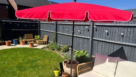 'A bright red parasol gave my new build patio a makeover - here are 4 colourful alternatives'