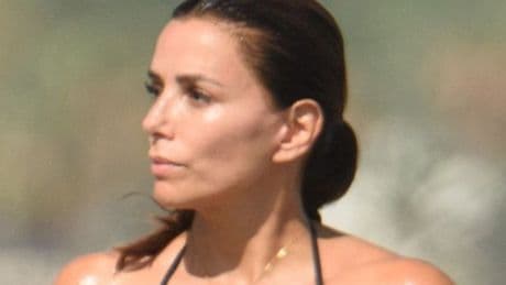 Eva Longoria shows off jaw-dropping figure in string bikini as she ditches America