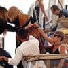 Kim Novak, 92, narrowly avoids a tumble as she steps off a boat in Venice with a helping hand - after Jude Law's near face-plant!