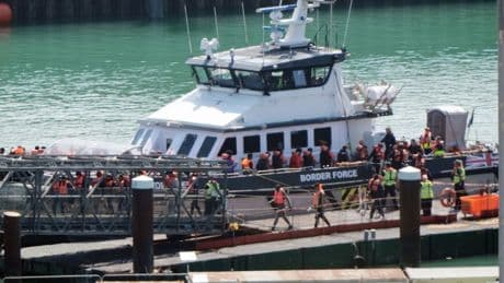More than 900 people arrived in small boats on Friday
