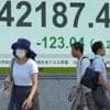 Asian benchmarks slip after US stocks sink and Japan faces political uncertainty