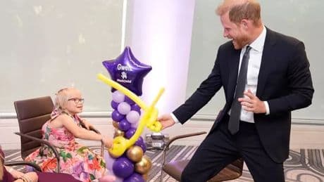 Prince Harry charms kids at emotional awards after avoiding William reunion