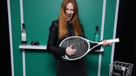 Karen Gillan rocks air guitar at US Open with husband Nick ahead of Highlander role