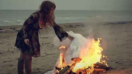 Scots singer burns wedding dress on Irvine beach in message to domestic abusers