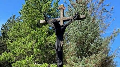 Crucifix set on fire during ‘senseless’ attack on Scots cemetery