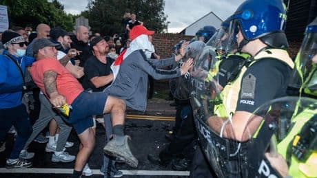 Protesters and police clash outside Essex hotel ‘housing asylum seekers’
