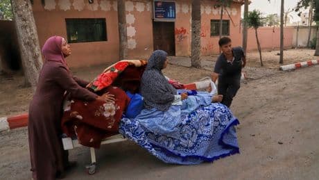 Israeli airstrikes in Gaza kill 48 people, including 22 children, hospitals say