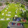 Travellers set up illegal encampment next to primary school as parents told to take 'extra precautions' when dropping their children off