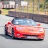 In blinkende Corvettes en Camaro’s genieten kindjes met kanker van Circuit Zolder: “Even weg van het ziekenhuisbed”