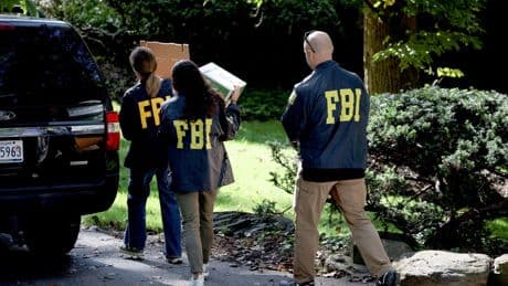 Donald Trump critic and former adviser has home raided by the FBI