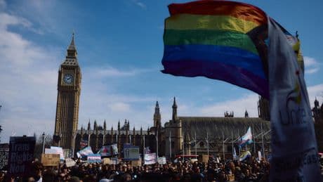Trans rights supporters rally outside UK parliament after landmark ruling
