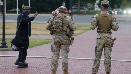 Schools reopen in Washington with parents on edge over Trump's armed patrols