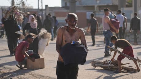 UN official says 47 were wounded, mostly by gunfire, when crowd overran aid hub in Gaza